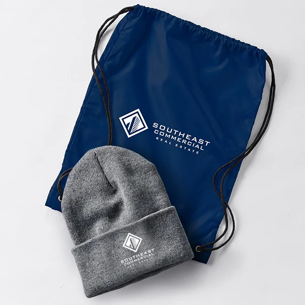 Drawstring bag and knit beanie hat.