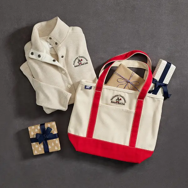 Gift set of a sweater, pullover and tote.