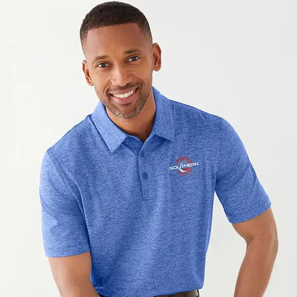 A man wearing a light blue polo.