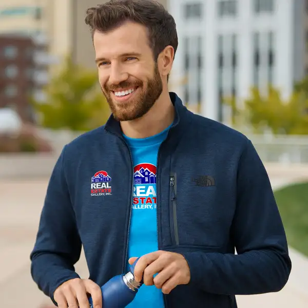 A man wearing a navy The North Face jacket.