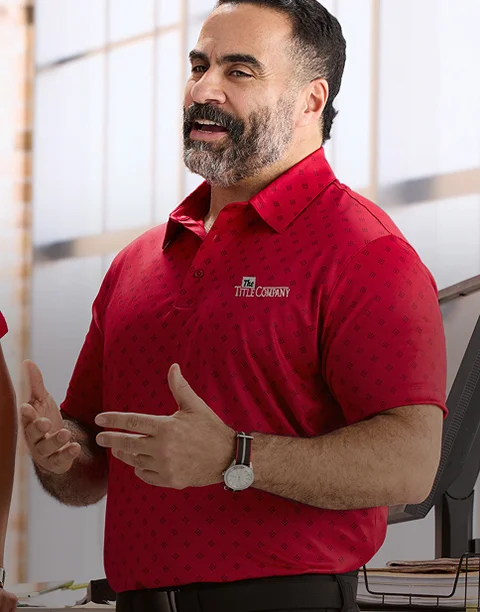 Man wearing an embroidered red rapid dry polo