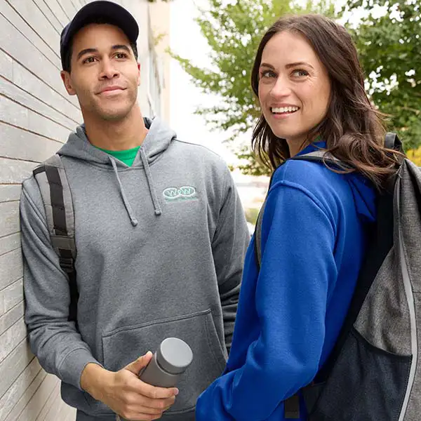 Two people wearing sweaters.