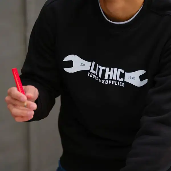 A black screen-printed long sleeve shirt.