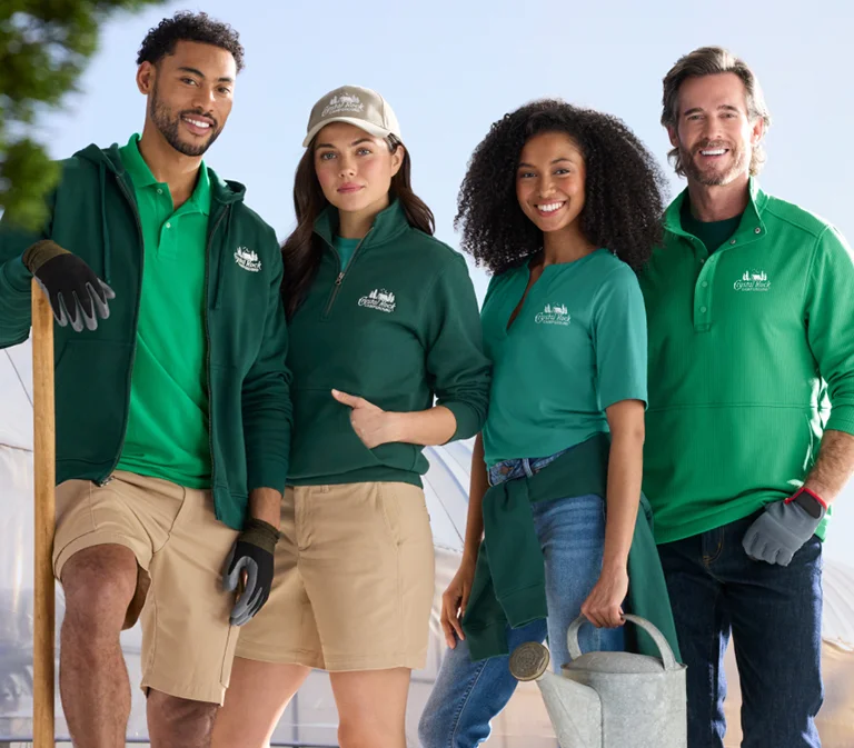 Team of employees wearing embroidered summer gear.