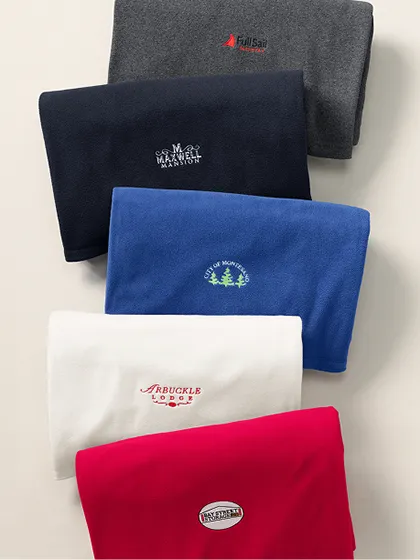 Red, white, blue, black and gray ThermaCheck 100 Fleece throws.